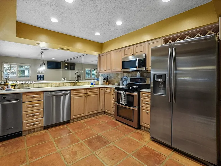 6975 Bianchini Cir — Photo 10