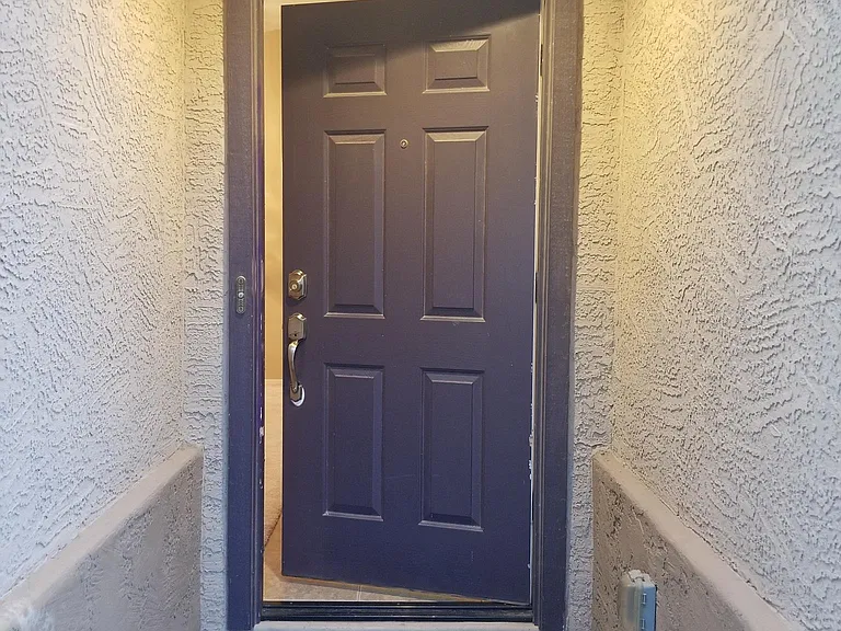 Front door has been painted.