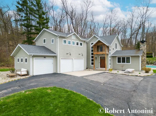 749 Grand River Dr NE, Ada, MI 49301