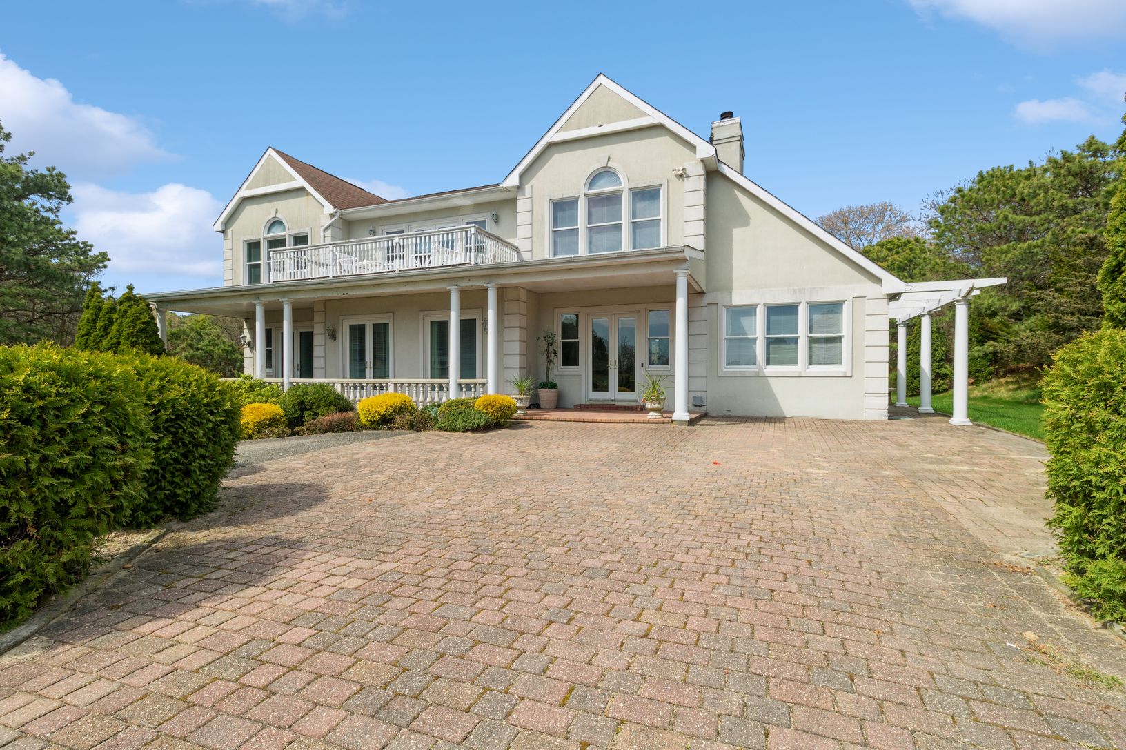  Brick driveway up to the welcoming entrance