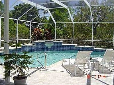 Screen Covered Pool and Heated Spa