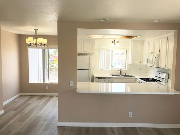 View into the kitchen from living room.