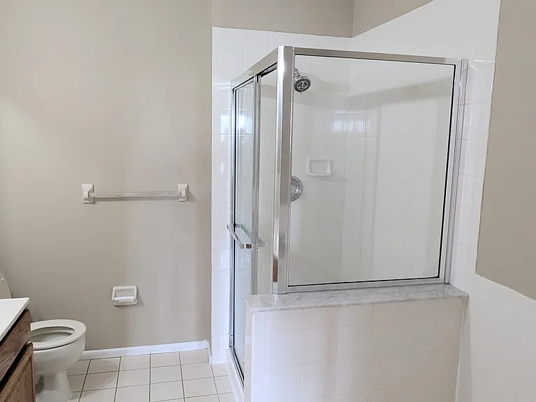 Master Bath with Shower, Double Sinks and Linen Closet( not captured in this photo)