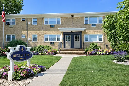 Village Arms Apartments Photo 1