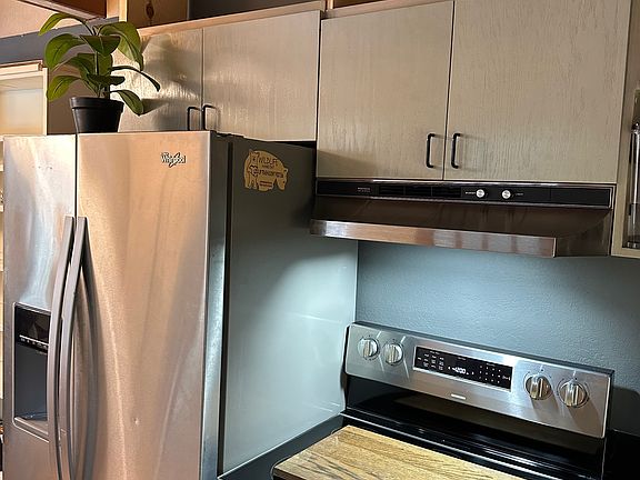 Refridgerator with ice maker/water, new electric range.