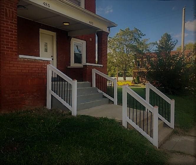 Sturdy new Handrails leading up to the porch