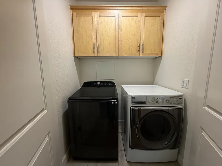 washer/dryer closet along the hallway on the 3rd floor