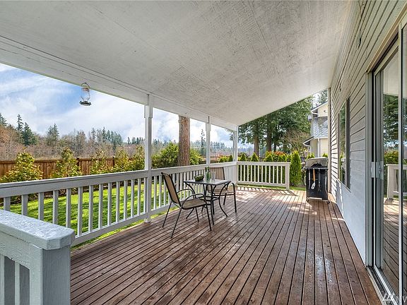 I had to slip in this photo of the amazing covered back deck. And look at that view! 