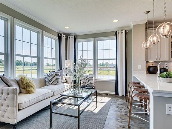 This photo is a model home photo or artist rendering due to construction stage.