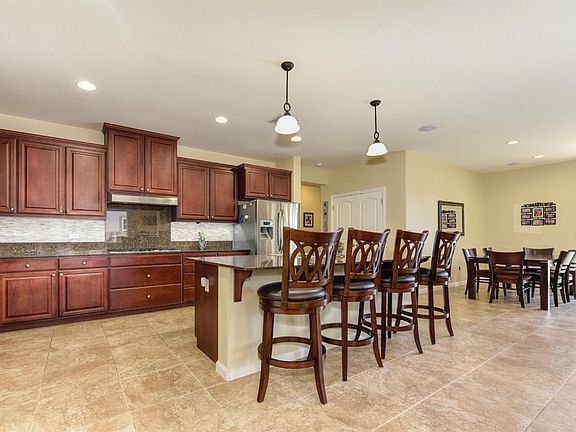 Updated kitchen granite counters and new backsplash, stainless steel appliances.