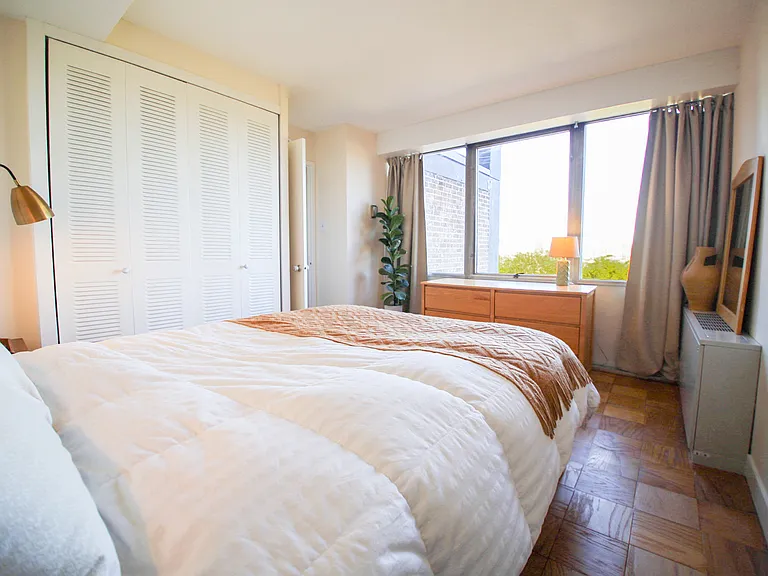 Master bedroom at end of hallway (pictured with queen bed)