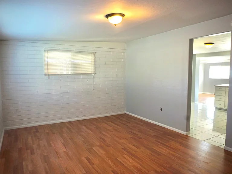 Main living room, could be used as 5th bedroom (no closet), home gym, office, flex space, etc.