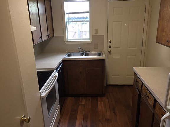 Kitchen w resurfaced countertops & glass cooktop range
