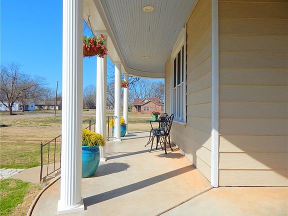 Large wrap-around, covered front porch.