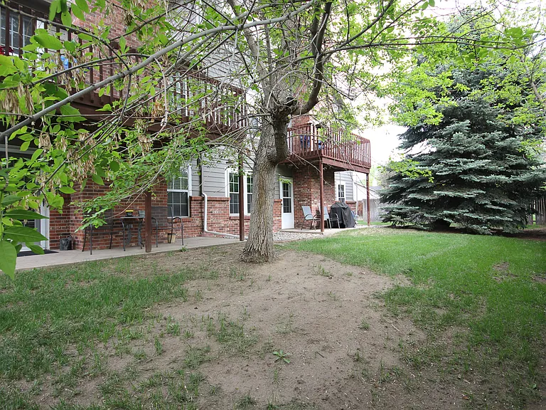 Backyard view home is main level unit