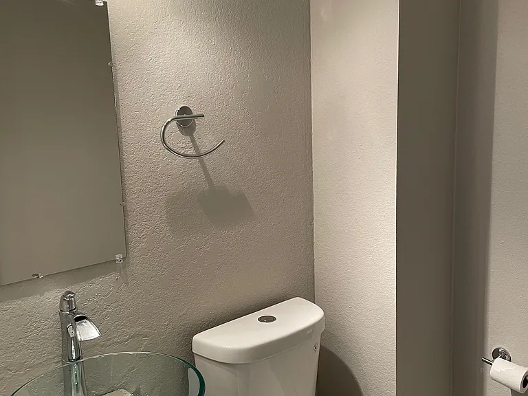 Main level half bathroom.