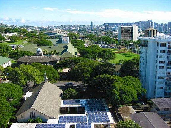 Panoramic view of Diamond Head and Honolulu skyline from living room.