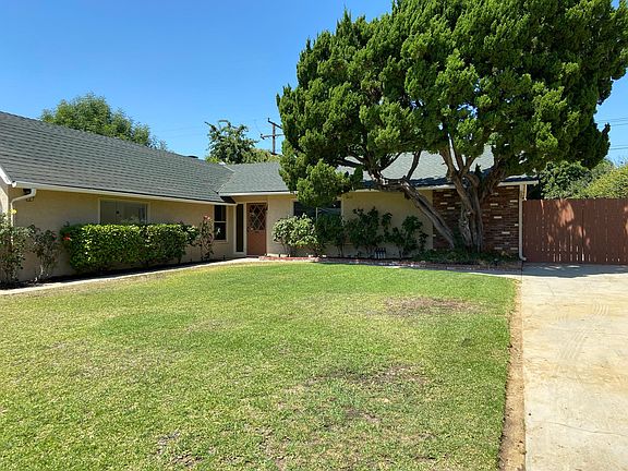 Large front yard with RV driveway or room for a basketball hoop