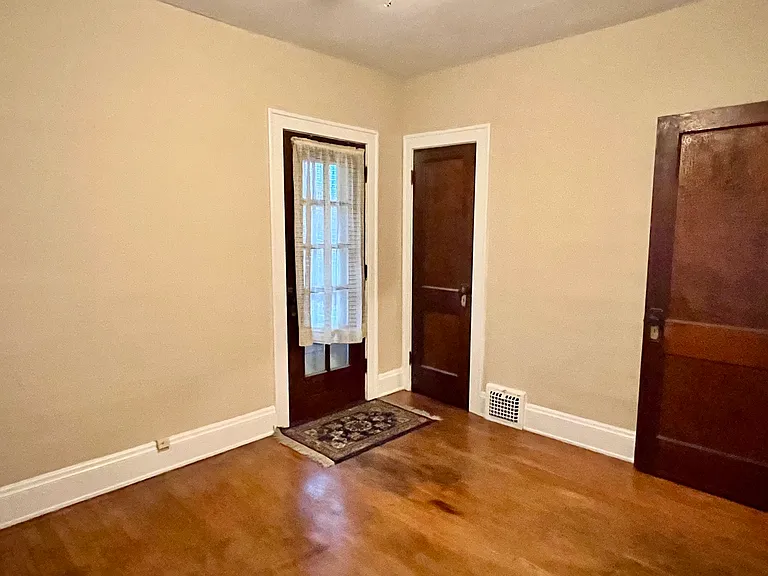 Bedroom 1 with closet and door to Juliet balcony