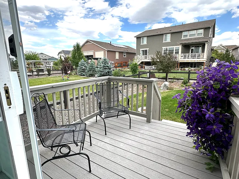 The private balcony connects to the shared backyard and offers a peaceful, bright outdoor retreat. It's the perfect spot to enjoy your morning coffee, read a book, or simply relax and take in the natural surroundings.