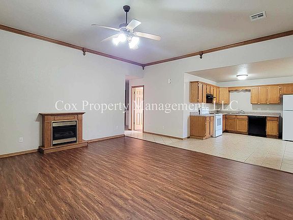 Living room has gas fireplace