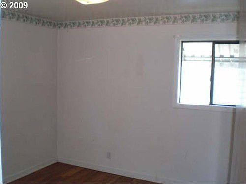 4th image of 8409 Saint Helens Ave