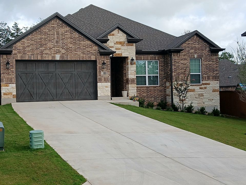 Extra long driveway on a 1/4 acre lot