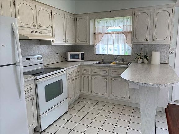4th image of 8450 Orleans N #13