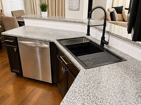 Kitchen with Chef's Sink with high bar sitting area