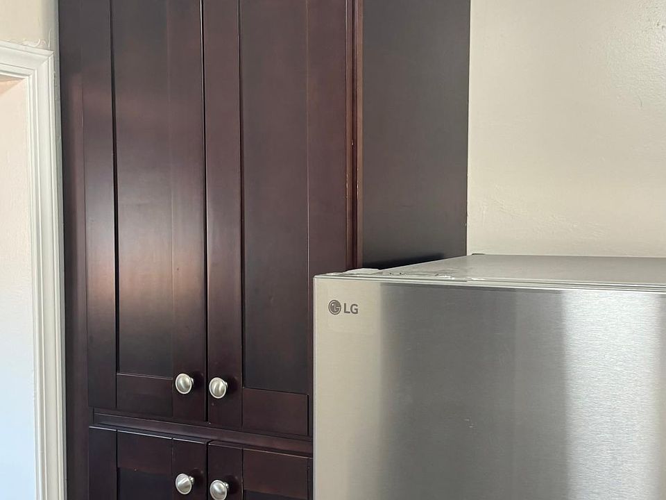Cabinet storage in kitchen.