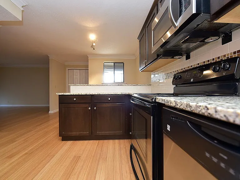 Step into elegance with a kitchen that blends style and functionality, perfect for contemporary living.