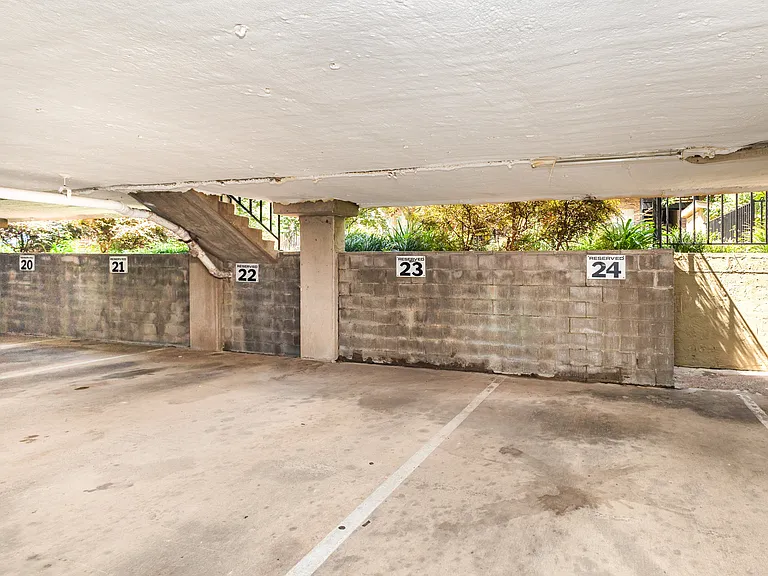 Private gated underground garage with 2 assigned parking spaces.