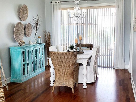 Formal dining area that leads to lanai/pool