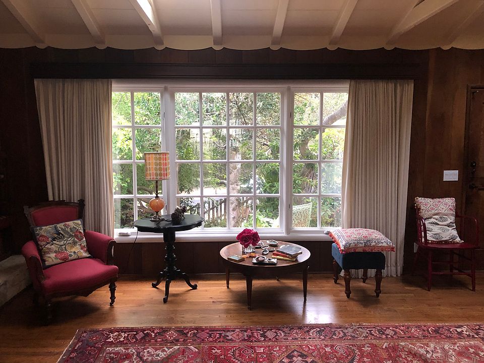 Charming living room with original heart redwood walls