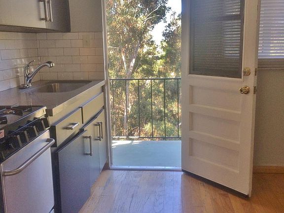 KITCHEN TO SHARED BALCONY