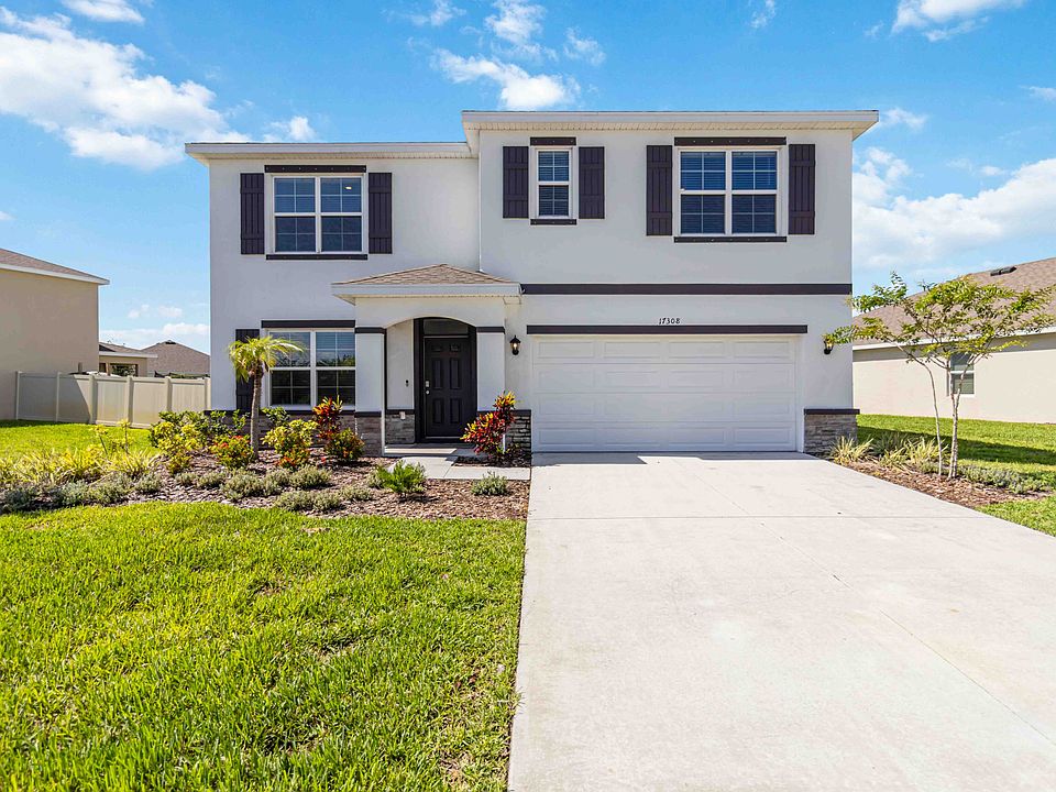Two Car Garage, Long Driveway and Lawncare Included.