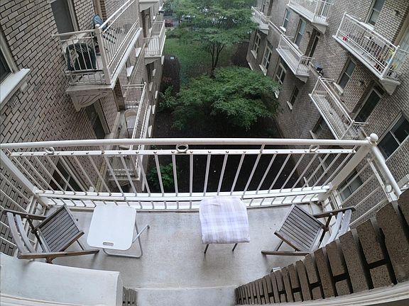 Both balconies overlook quiet courtyard.