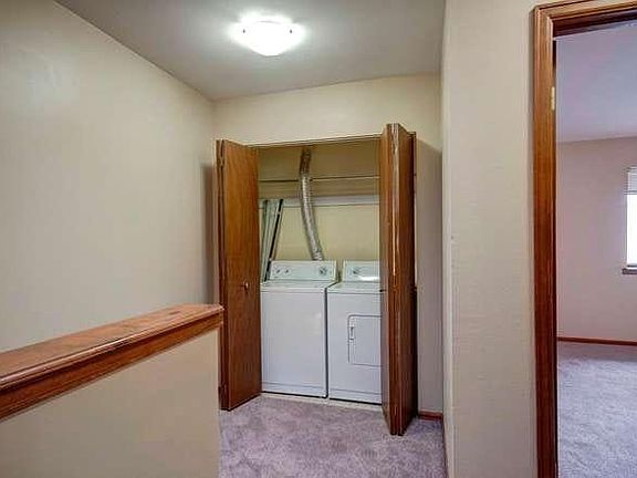 In-unit, large capacity washer and dryer.