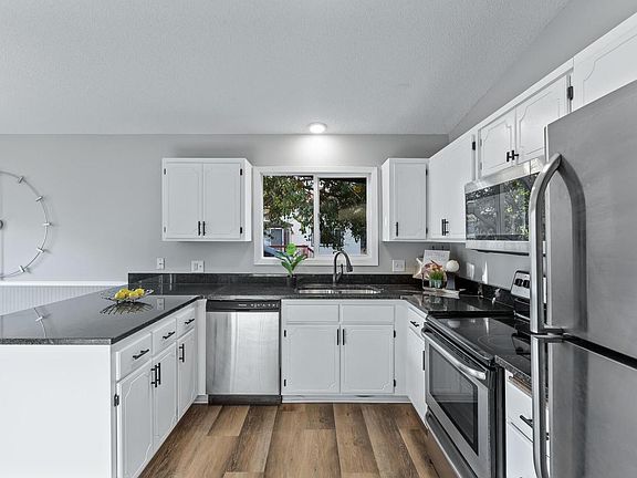 5th image of 8324 Logan Ave N