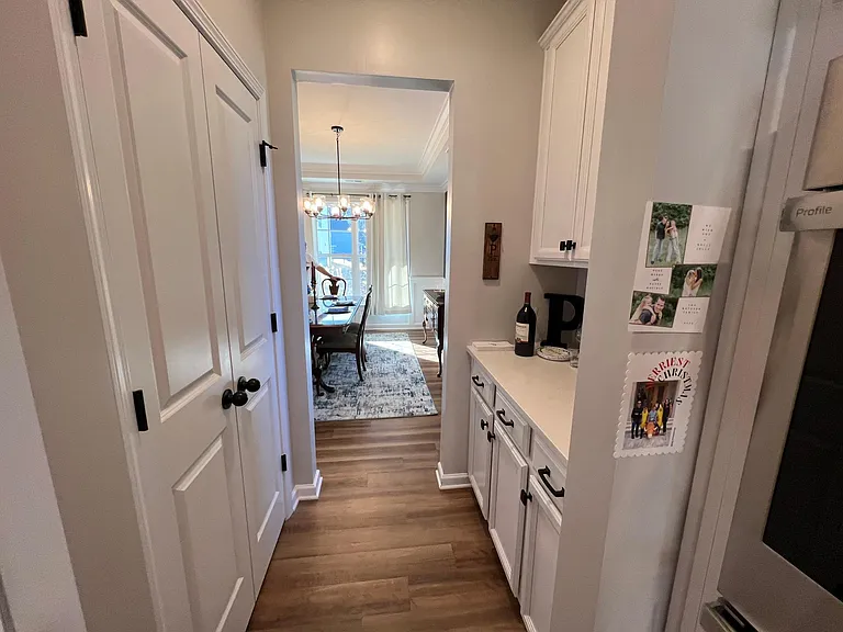 Butler's bar and pantry leading into dining room