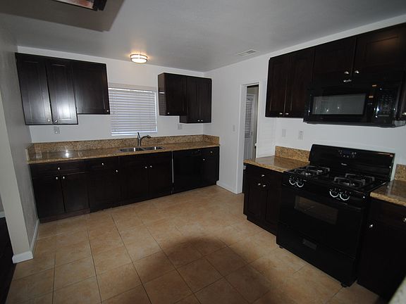 4th image of 12705 Berendo Ave