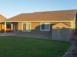 Back Fenced Yard. Storage Shed