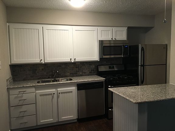 stainless steel appliances and shaker cabinet doors with sof