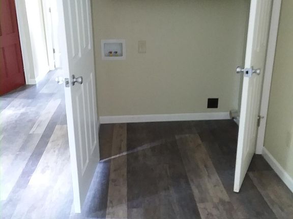 Enclosed washer and dryer area. Owner will supply washer and dryer if needed.