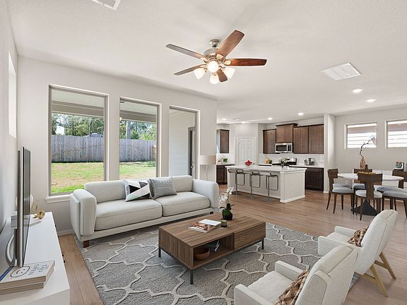 This home boasts a spacious open concept layout that combines the best of modern design and comfort