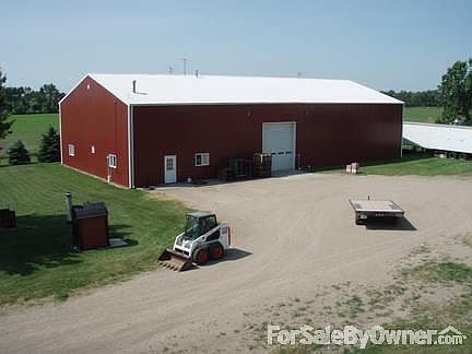 54x106x19 Morton building, insulated
						:
						Has 3 interior rooms with insulated overhead doors; floor heat in 2 shop rooms.