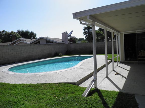 Patio by sparkling pool