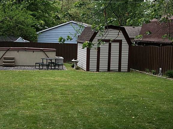Yard. Mini barn with newer siding and roof. Swimspa is negotiable with acceptable offer.