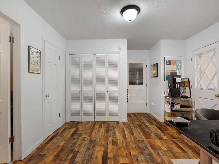 Utility room, which contains first-floor 1/2 bath, laundry room, garage access, walk-in pantry, and optional office space
