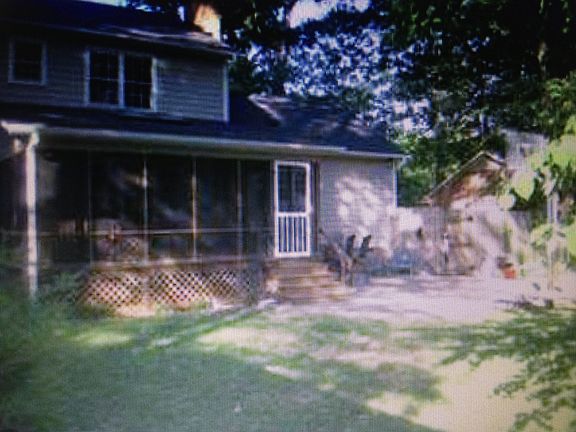 Screened-in back porch